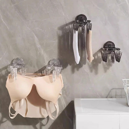 Suction cup folding clothes hanger with clip